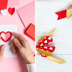 Création d'un cadeau Saint Valentin DIY : mains assemblant un cœur en papier sur une carte, et des nœuds décoratifs rouges et dorés.