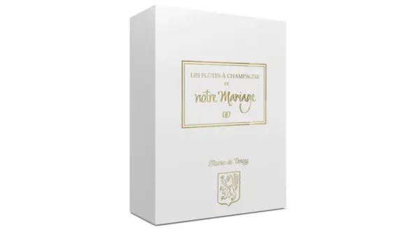 Boîte blanche pour des flûtes à champagne personnalisées mariage, avec inscription dorée "Les flûtes à champagne de notre mariage" et blason de la Mairie de Venizy.