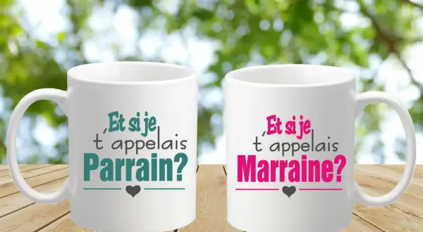 Deux tasses blanches avec l'inscription "Et si je t'appelais Parrain?" et "Et si je t'appelais Marraine?". Un cadeau original pour demander à quelqu'un d'être parrain ou marraine.
