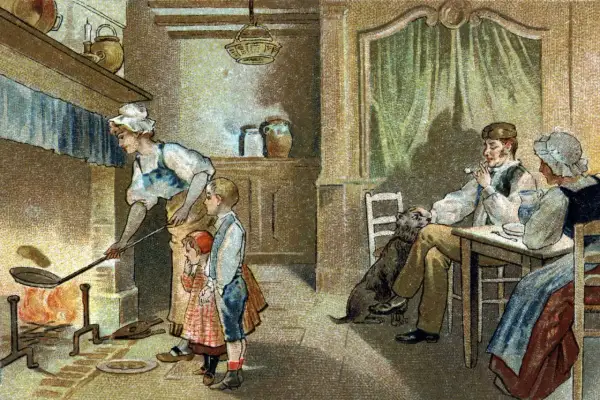 Une famille prépare des crêpes près du feu, une tradition qui rappelle qu'est-ce que la Chandeleur. Un chien attend patiemment.